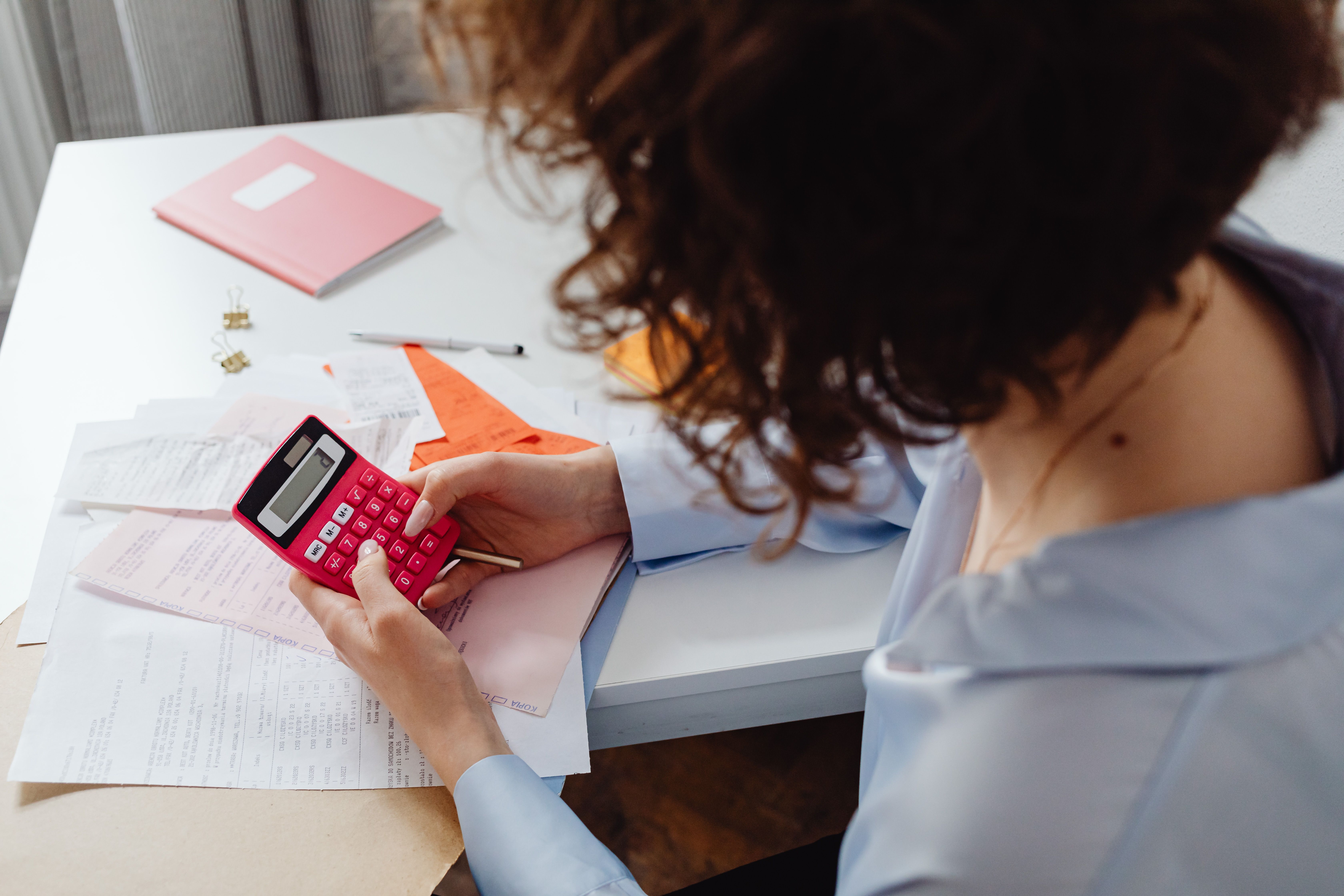 Creating a realistic monthly budget and organizing personal finances