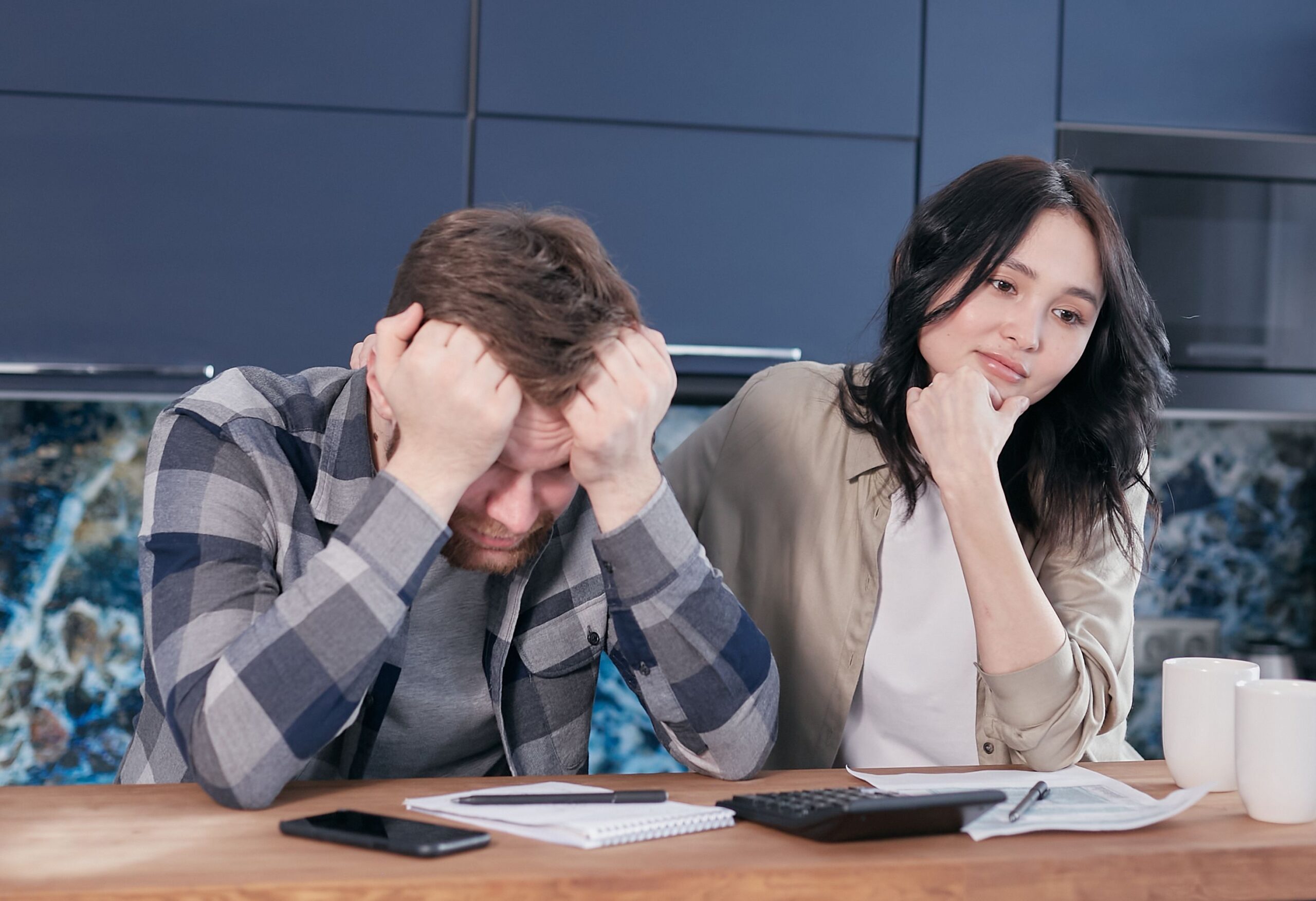Person planning debt repayment and organizing personal finances